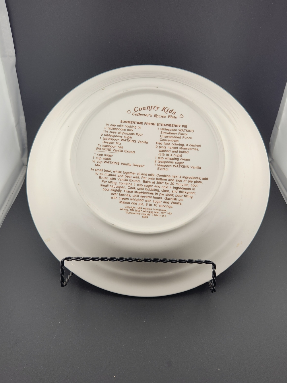 White Ceramic Pie Plate with Pastel Green Trim and Kids Illustration - Picture 2 of 7
